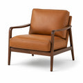Sillón de cuero sintético y madera de nogal