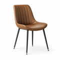 Silla de cuero sintético marrón con patas de metal negro