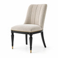 Silla de comedor tapizada en poliéster beige con patas de madera negra